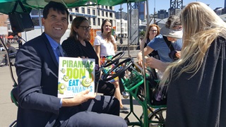 Mayor Justin Lester on the library Book Bike