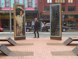Installation image of Flanerie and Figments showing NAKED LADY WITH TATTOOS.