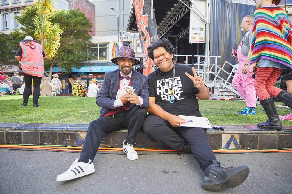 Two people posing for a photo at Te Aro Park as part of Cuba Dupa. 