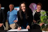 Councillor Jill Day signing Tākai Here agreement
