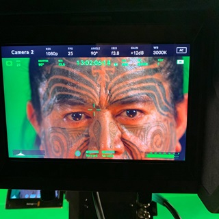 A close-up shot of Toa Waaka on set filming Ahi Ka at Avalon Studios.