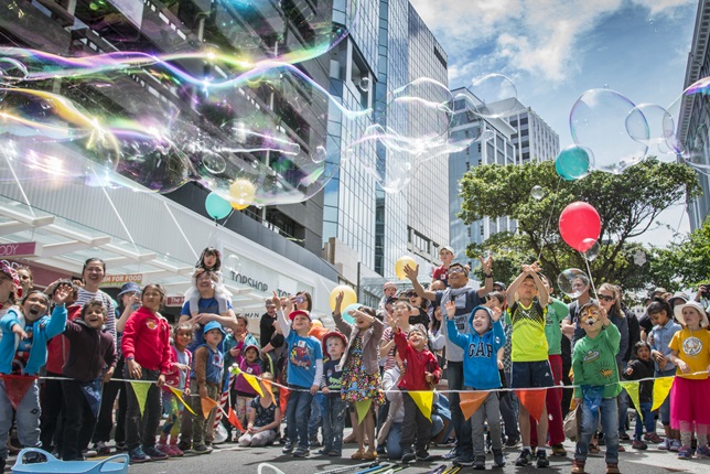 Children play with bubbles on Lambton Quay as part of Wellington City Council's Very Welly Christmas. 