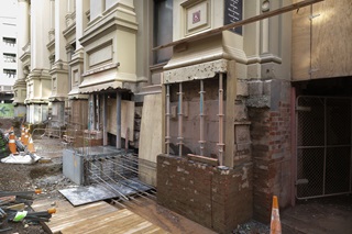 Exterior of Wellington Town Hall showing strengthening work on the foundations. 