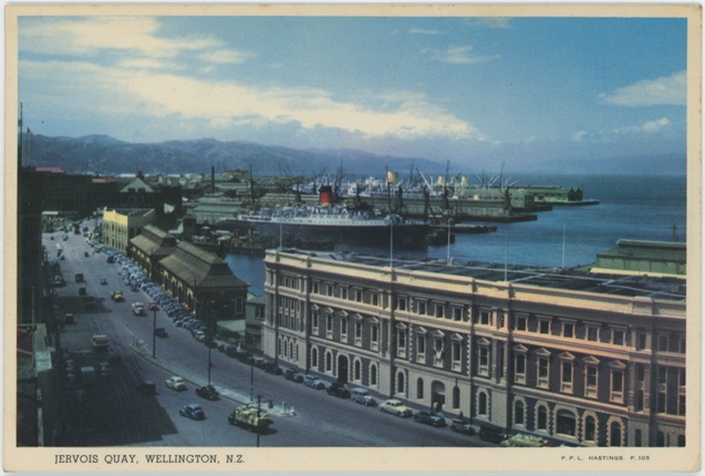 An old postcard of Jervois Quay with large ships in the harbour from 1958.