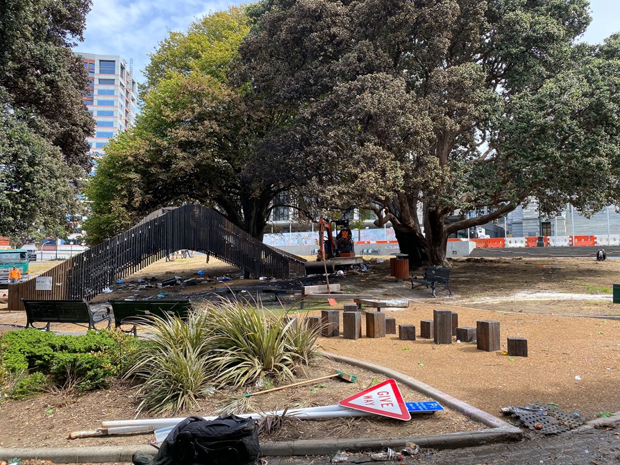The Parliament playground blackened from a fire.