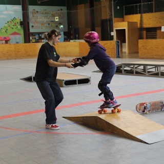 Two people skateboarding.