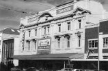 A black and white photo of the outside of St James Theatre.