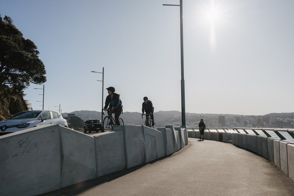 Cyclists and walker on Ōmarukaikuru/Pt Jerningham pathways.