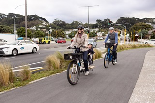 Family on bikes on Cobham Drive.