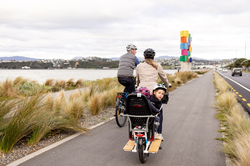 Family riding bikes along Cobham Drive shared pathways. Family riding bikes along Cobham Drive shared pathways.