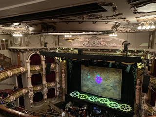 Inside the St James theatre with the stage showing the setup for the musical 'Wicked'.