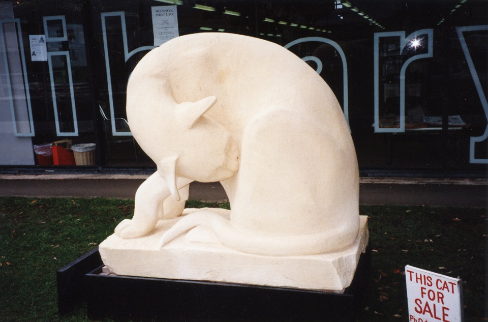 Cat sculpture with for sale sign outside Miramar Library in 1997 courtesy of Wellington City Archives.