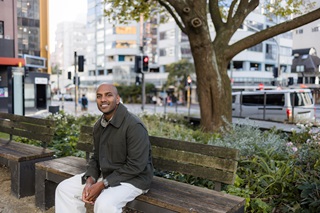 Prak on a bench in the CBD