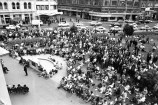 Black and white photo of a crowd in Civic Square.