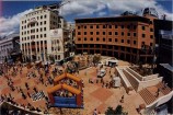 Crowds of people gathered in Civic Square with a bouncy castle set up in the centre.