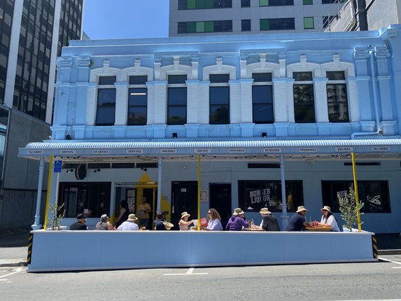 View of burger liquor from the side of the road.