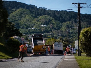 image of road workers fixing the road