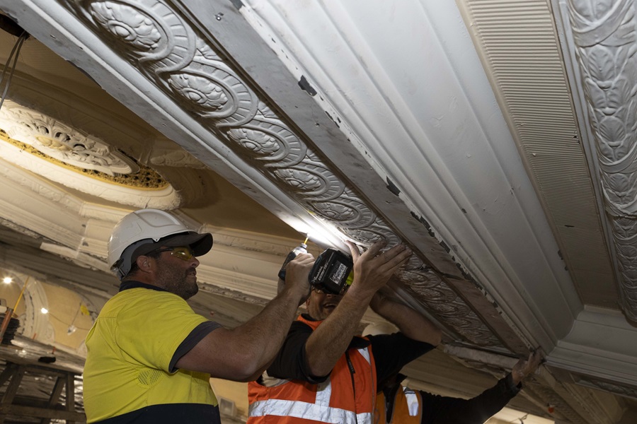 national pressed metal contractors reinstalling a heritage tile