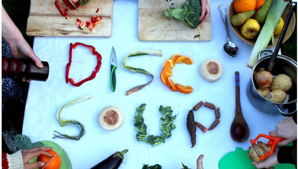 Food turned into Disco Soup words on a table to promote Kaibosh event for WOAP.