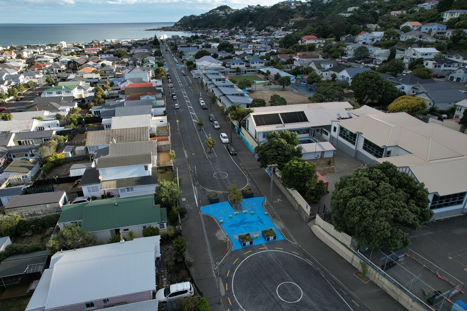 Drone photo of street calming innovations and mural on Freyberg Street looking towards Lyall Bay.