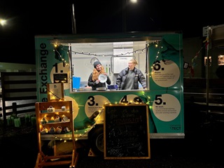 Image of two young women in the Karori Market Wash truck