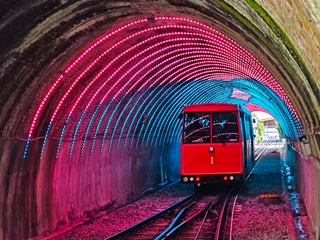 Image of colourful led lights in cable car tunnel