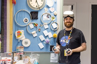 Image of Jamie and his Laser cut creations