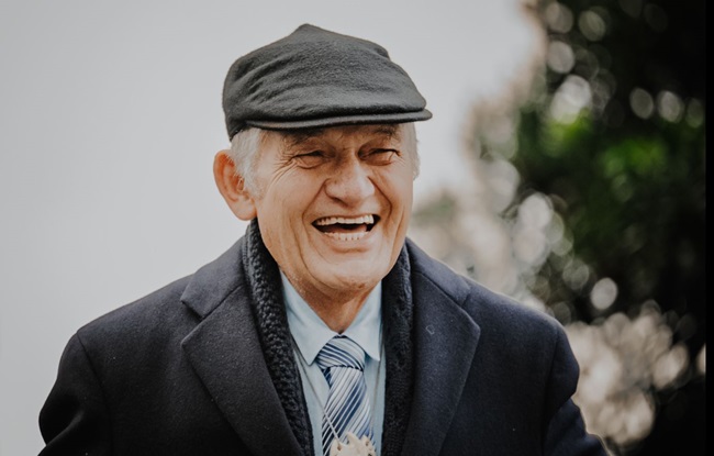 Māori King Tūheitia laughing.