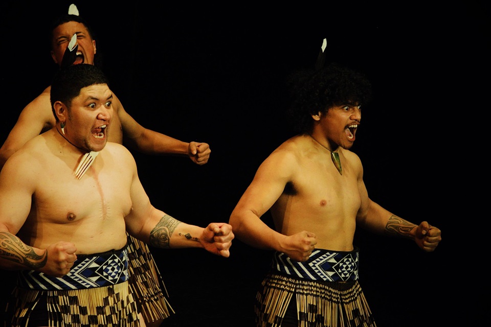 Te Ahi a Tahurangi kapa haka group in action on stage.