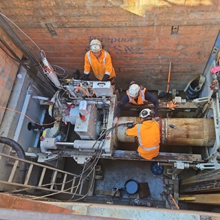 Image of Wellington Water workers connecting the pipes