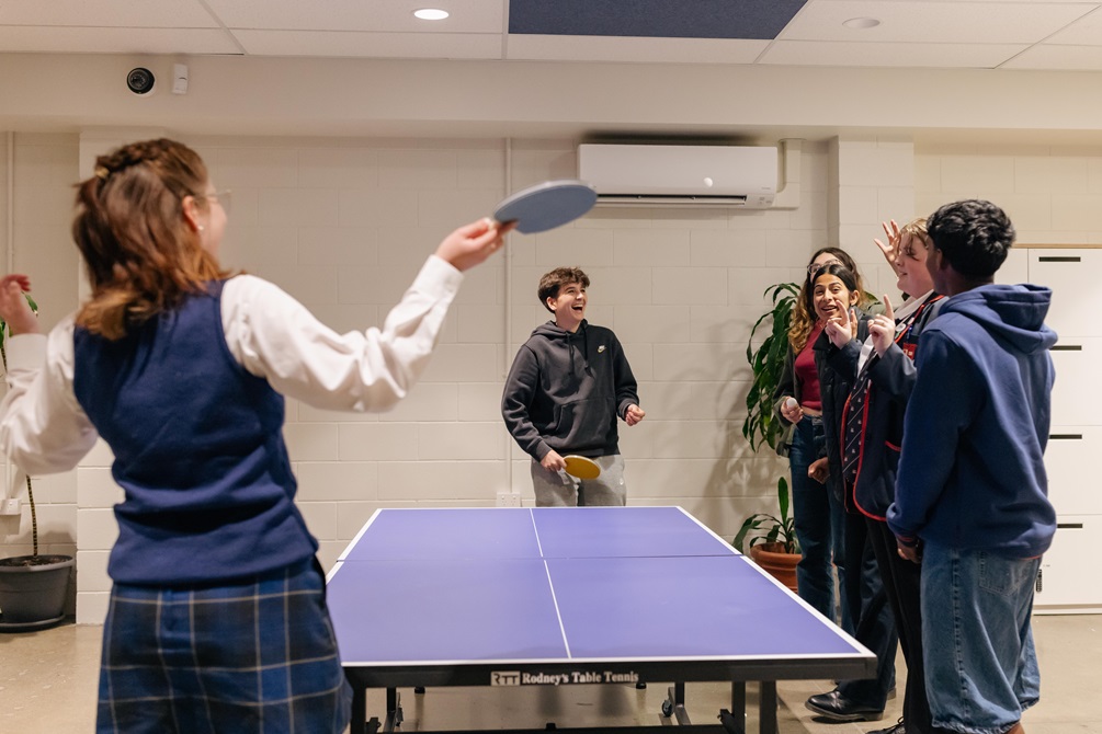 image of Young people playing table tennis at the youth hub