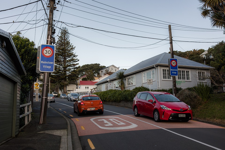 30km/h zone near Wadestown village with signage on roads and poles.