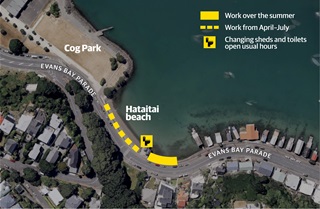 An aerial view of a road running between a beach and residential housing, with yellow graphic markings showing where road works will be taking place.