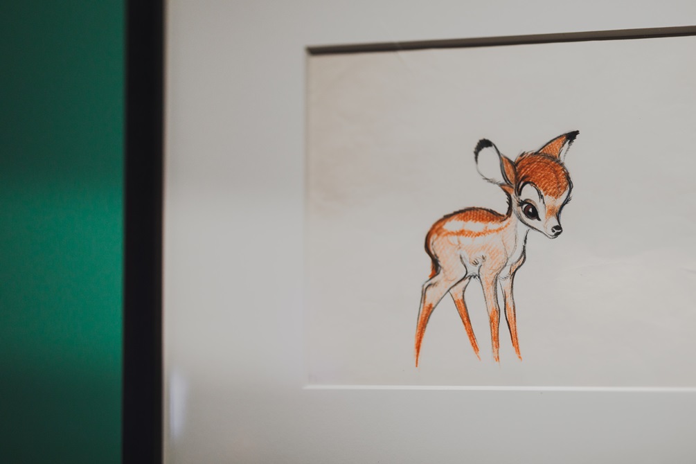 Sketch of Bambi from Bambi the movie, inside a black frame on the wall.