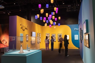 A look inside the Disney exhibition with lanterns dangling overhead.