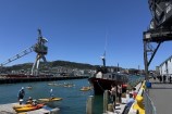 Boats and kayaks in Wellington's harbour.