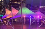 Lit up sails on the Wellington waterfront.