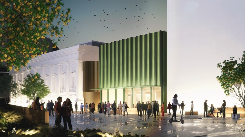 Render design showing exterior view of proposed Town Hall annex during the night from Te Ngakau.