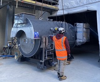 A boiler being installed at a sludge facility.