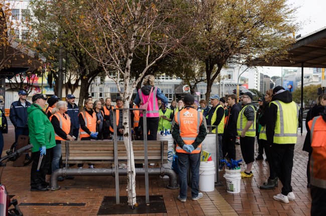 Volunteer briefing at Courtenay Place during clean-up operation.