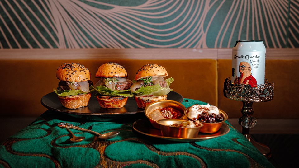 Three burgers and a beer for WOAP from Zephyr at Takina - by Beeline Photography.