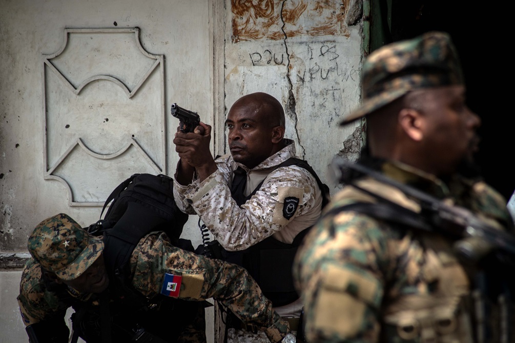 Photo credit Clarens SIFFROY - Police forces take part in an operation against powerful gangs in the city center near the National Palace in Port-au-Prince on July 9, 2024.