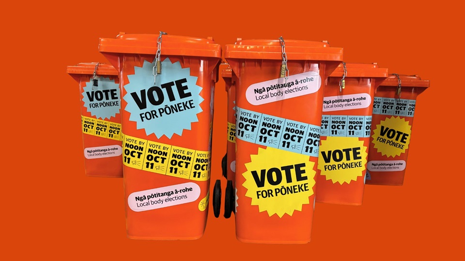 Groups of orange ballot bins with orange background.