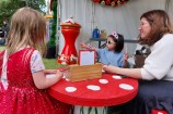 Children doing crafts at a Christmas event.