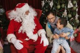 A child visiting Santa.