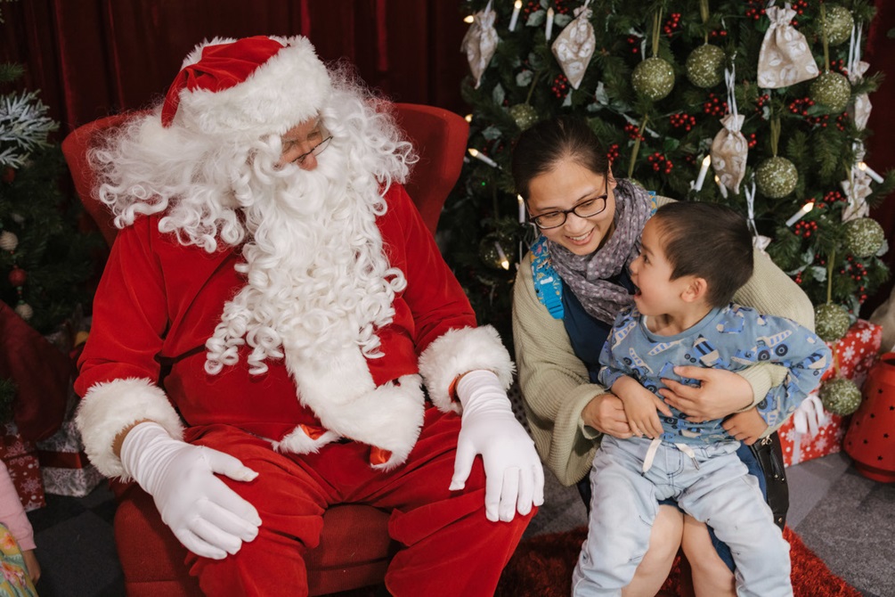 A child visiting Santa.