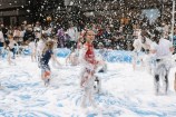 Children covered in bubbles/ foam.