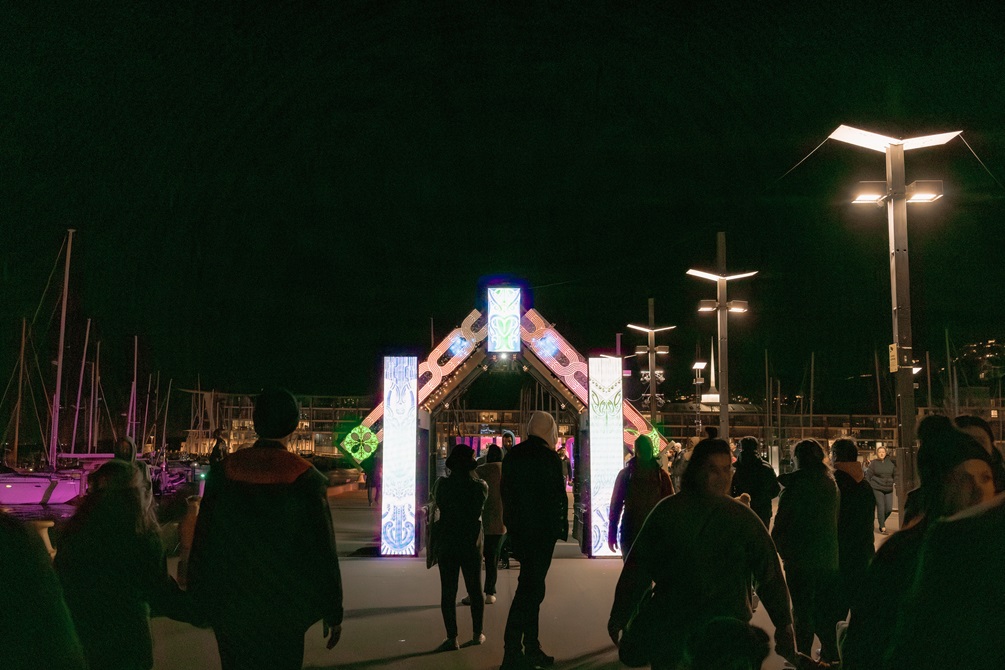 A gateway lined with digital screens welcomes visitors to the Matariki celebrations.