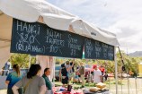 A food stall at the event selling hangī, fritters and fry bread.