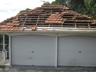 Unsecured clay roof tiles.